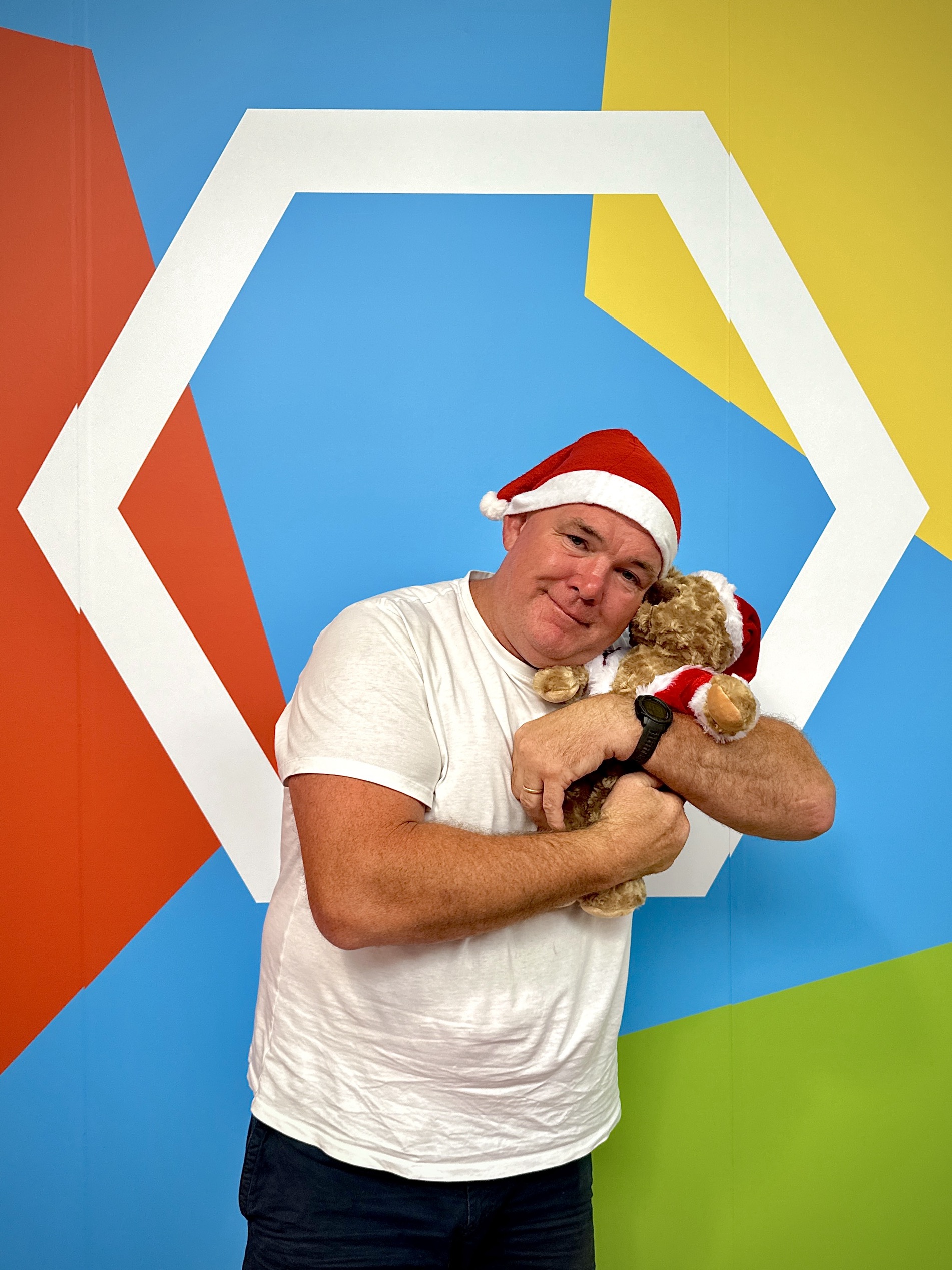 CEO Owen Finegan and Santa Bear